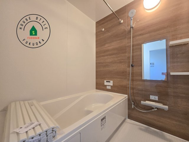 福岡市南区鶴田4丁目第5-3棟（2号棟）の内観：施工例|1日の疲れを癒してくれる広々バスルーム。雨の日のお洗濯にも大活躍な浴室乾燥機付です！