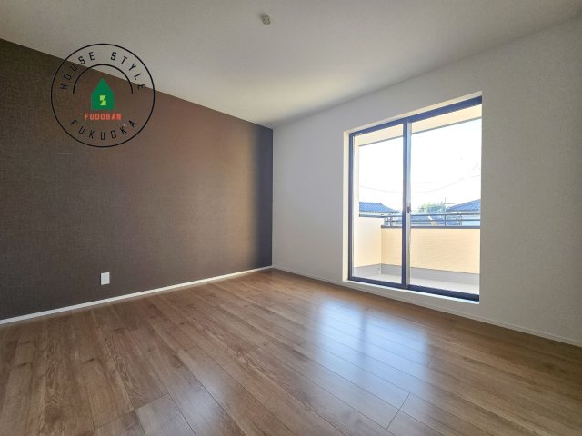 福岡市南区老司1丁目第8-3棟（1号棟）の内観：施工例|落ち着いた色調の洋室です。