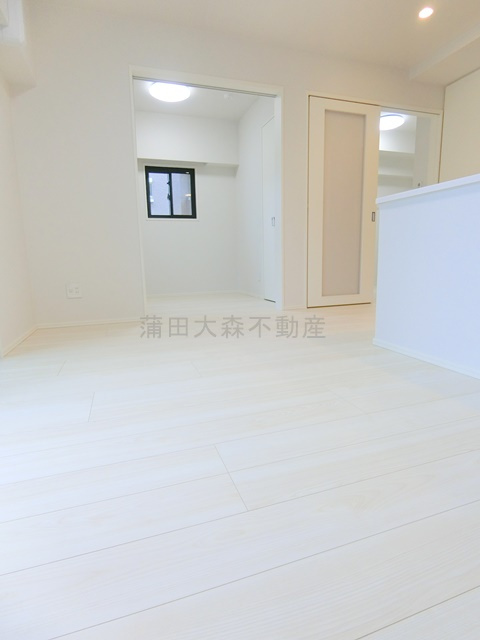 Garden Xavis(ガーデンザヴィス南蒲田の居間・リビング|LDK10帖　カウンターキッチンのリビングダイニングキッチン