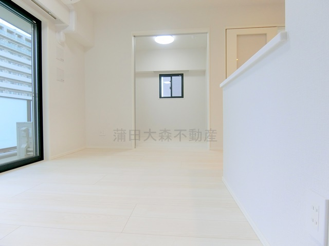 Garden Xavis(ガーデンザヴィス南蒲田の居間・リビング|LDK10帖　カウンターキッチンのリビングダイニングキッチン