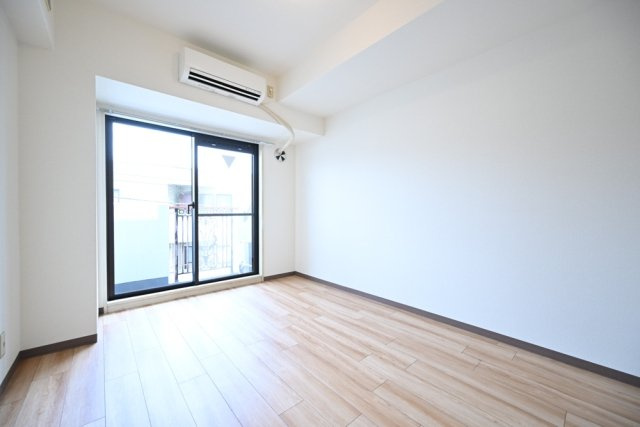 ナイスアーバンスピリッツ鶴見市場Ⅱ芦澤ビルの洋室