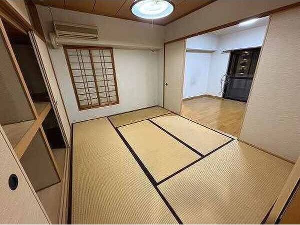 サーパス平成の寝室