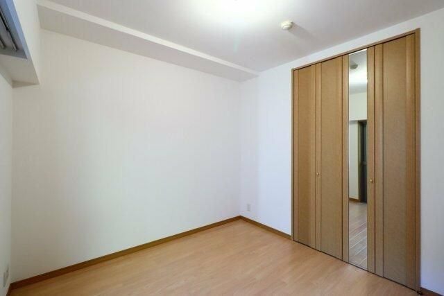 リブゼ横浜紅葉坂の寝室