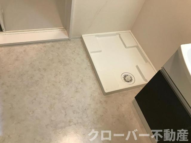メゾン・クワトロの玄関|洗濯機置場