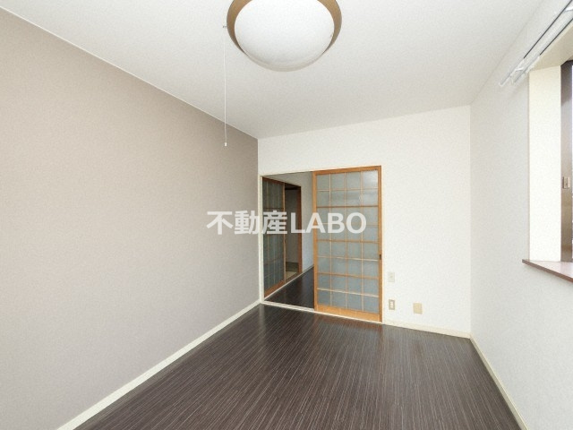 リアライズ平野西の洋室