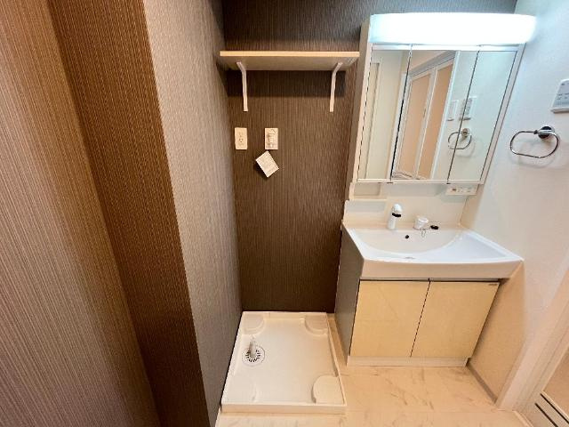 アドニスの洗面所|洗濯機置場