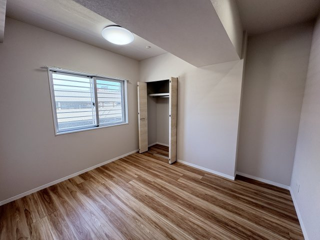 プレミアムコート浦添牧港の洋室