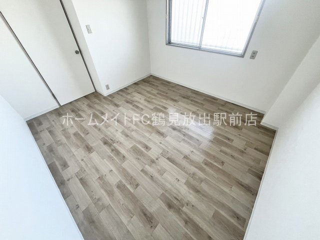 大阪市城東区放出西３丁目の賃貸マンションの洋室