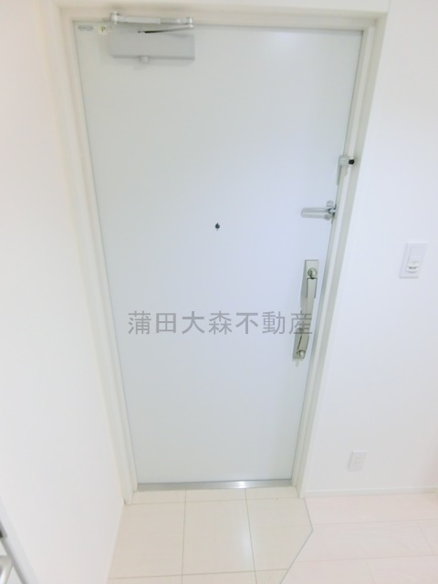 LUORE池上の玄関