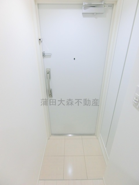 LUORE池上の玄関