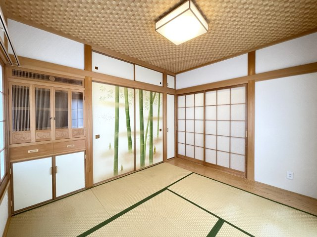 川口貸家の寝室|1F5.2帖和室