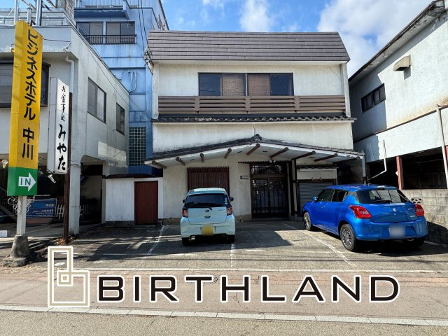 想定年間賃料　60万　想定利回り　21.4％　木造店舗