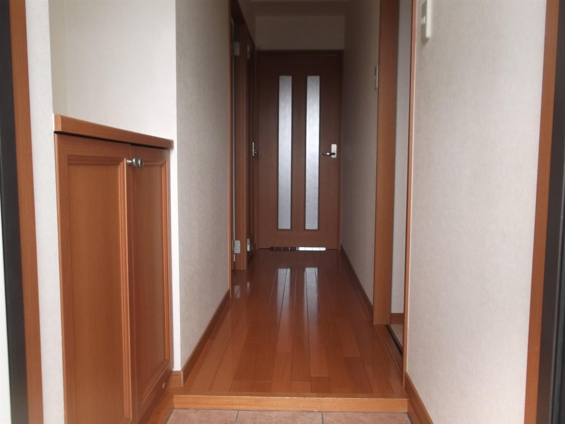 三門マンションの居間・リビング|玄関