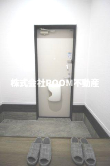 三股町貸家の玄関|収納もある玄関です