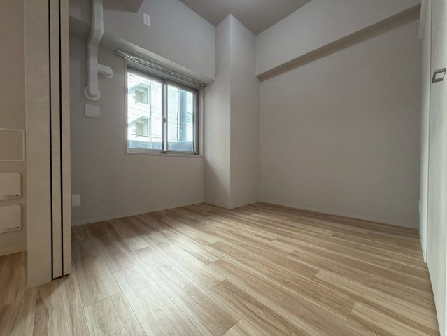 エスリードレジデンス　ザ・グラン南堀江の洋室