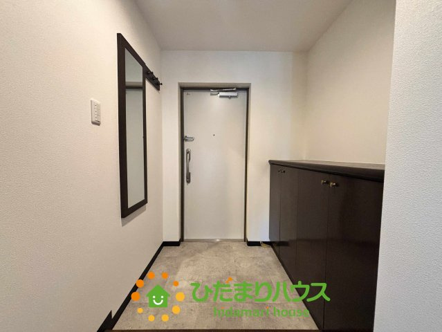 ライオンズガーデン花崎J棟　の玄関