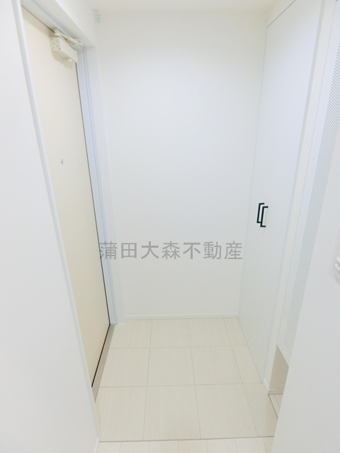 LUORE池上の玄関