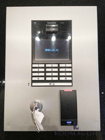 プレサンスジェネ丸の内のエントランス