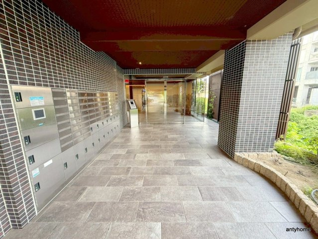 プレアデス千里山田　仲介手数料無料のエントランス