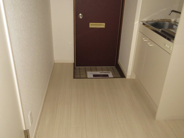 グリーンコーポⅢの玄関|室内洗濯機置場