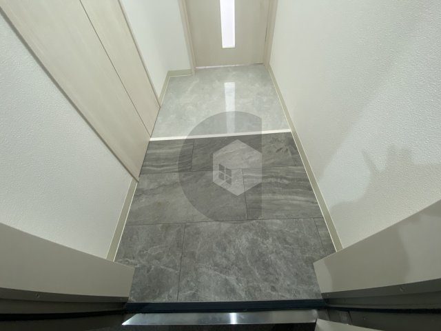 クリエオーレ小若江の玄関