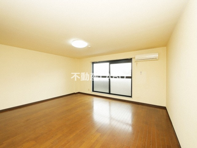 ドミール喜連の洋室