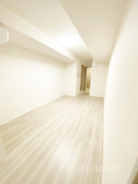 ルリアン北小岩Ⅱの寝室|リビング