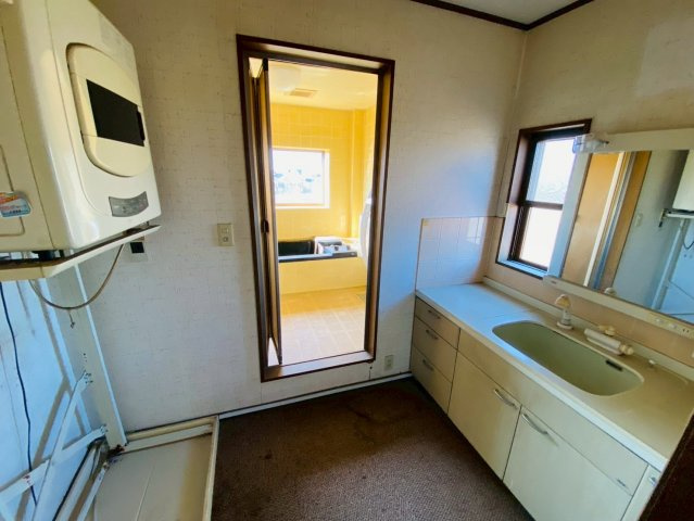 八街ほ　店舗付き住宅のランドリースペース