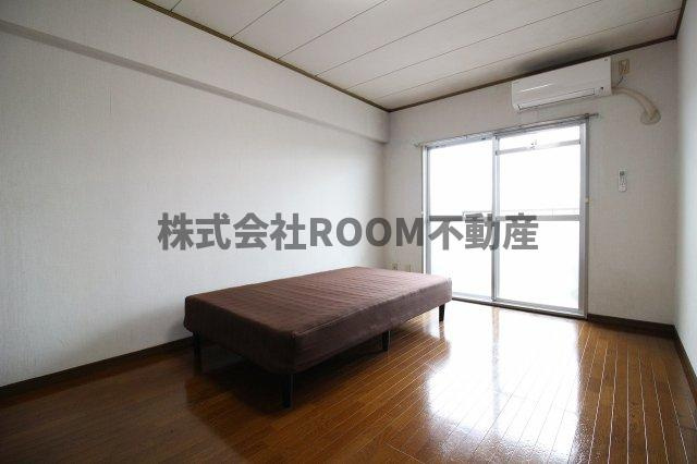 サンライズ都北の寝室