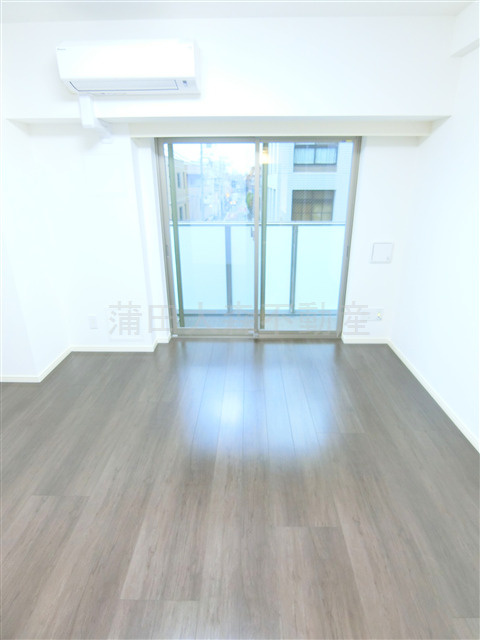 ベルシード蒲田Ⅱの居間・リビング|洋室8帖