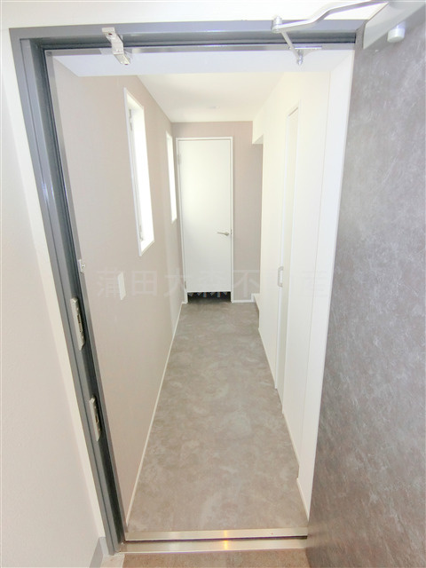 グランカーサ蒲田ウエストの玄関