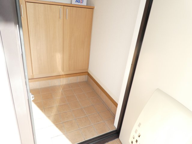 ヴィラーチェＫＡＭＥＩの玄関