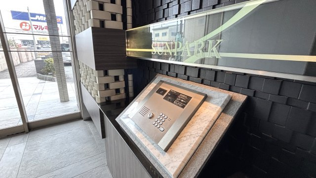 サンパーク久留米東VITAZIONEの玄関