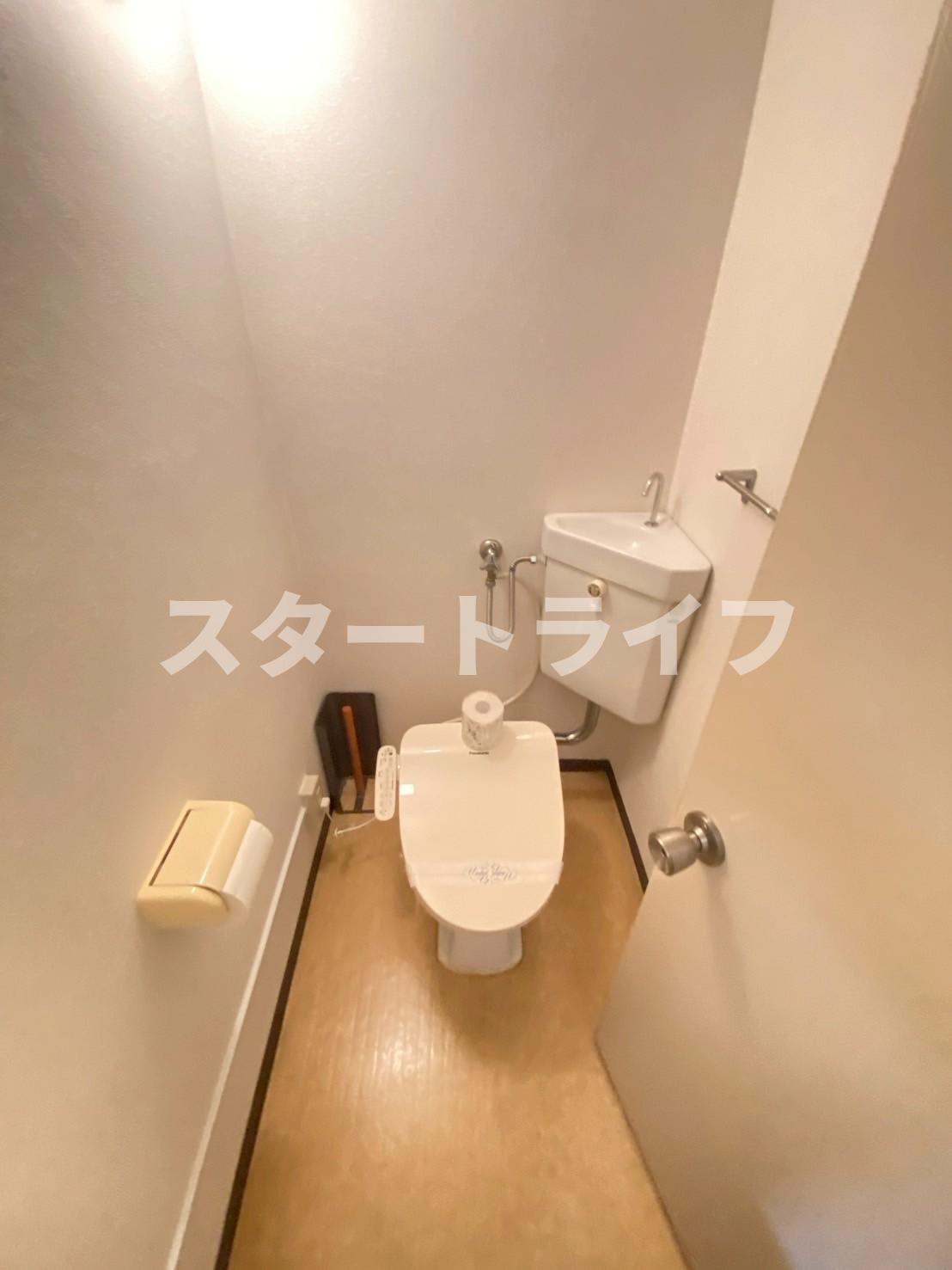 大阪市東淀川区西淡路１丁目の賃貸マンションのトイレ