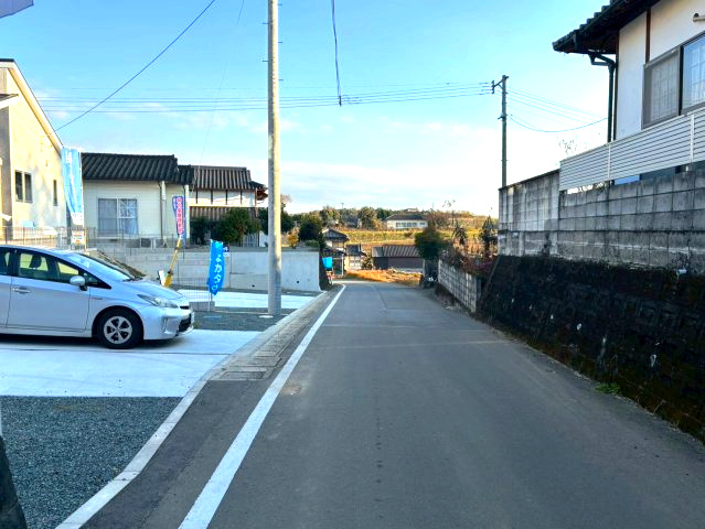 仲介手数料不要　よかタウンBloom合志市合生2期【西合志第一小・西合志中】の前面道路含む現地写真