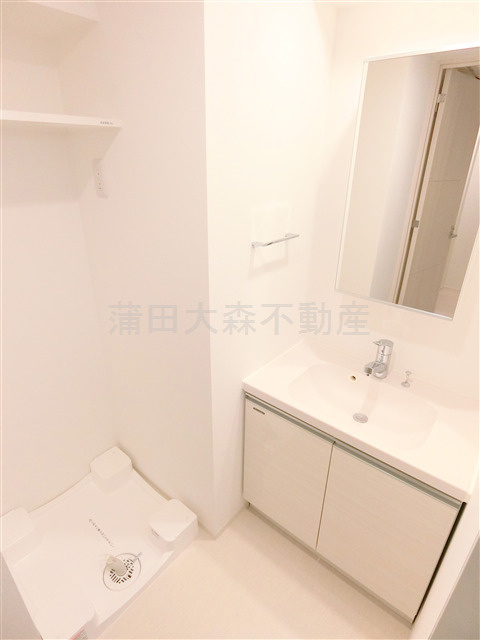 アーバンパーク蒲田南Ⅱの洗面所|洗面脱衣所　独立洗面台と洗濯機置き場