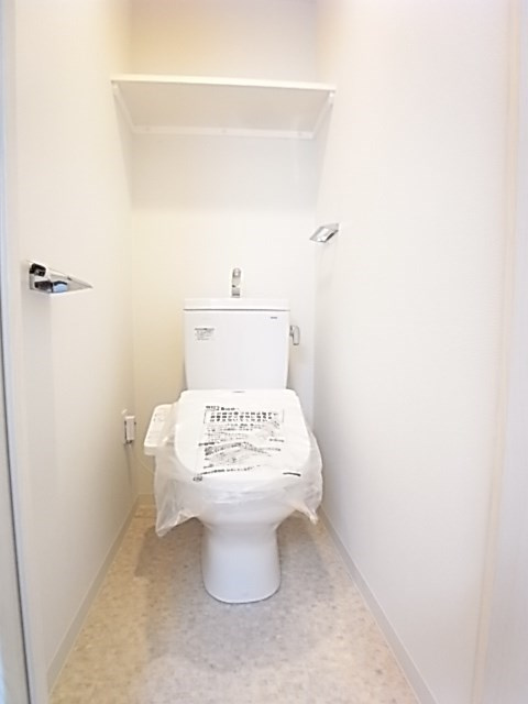 レジデンス神戸大倉山グルーブのトイレ|落ち着いた色調のトイレです