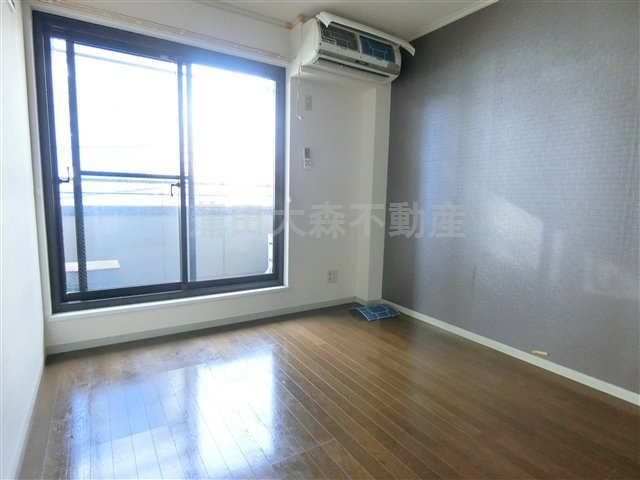 ドルフ武蔵新田　の居間・リビング