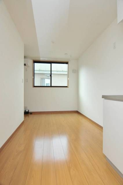 カーサビアンカ高松の居間・リビング