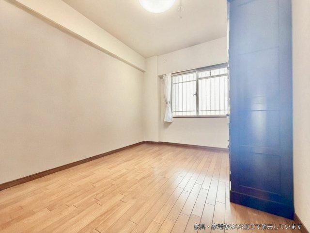 マークスタウン・グランフィーネ川西の洋室|洋室　約6.0帖
※一部既存家具はAIで削除しております。