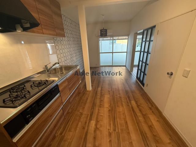 リバーサイド天川の居間・リビング|ＤＫ８帖