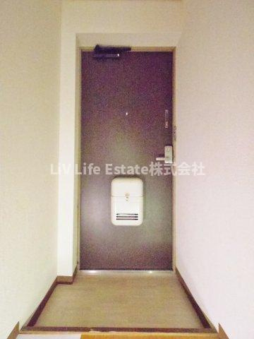 小平市鈴木町２丁目の賃貸マンションの玄関