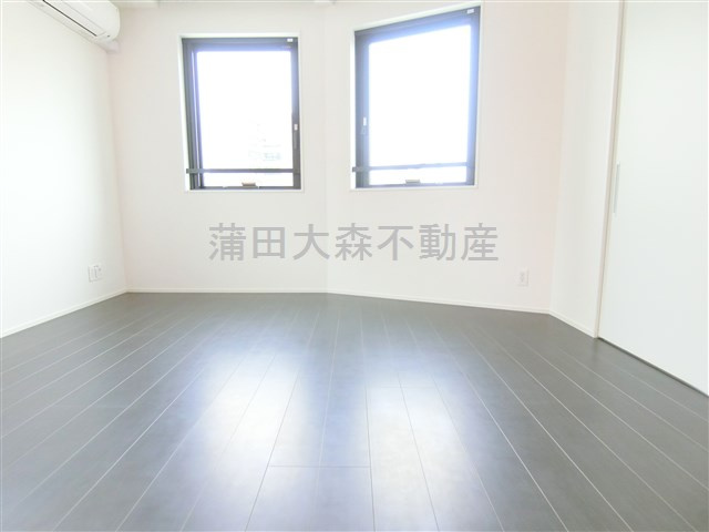 The Aigrette Minami-Kamataの居間・リビング