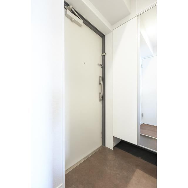 プレアデス千里山田の玄関