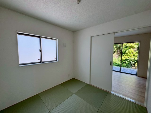 クレイドルガーデン南城市佐敷佐敷 第1・1号棟の和室|リビングに隣接するタタミコーナー4.5帖