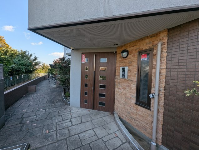 コージィコート桜井のエントランス