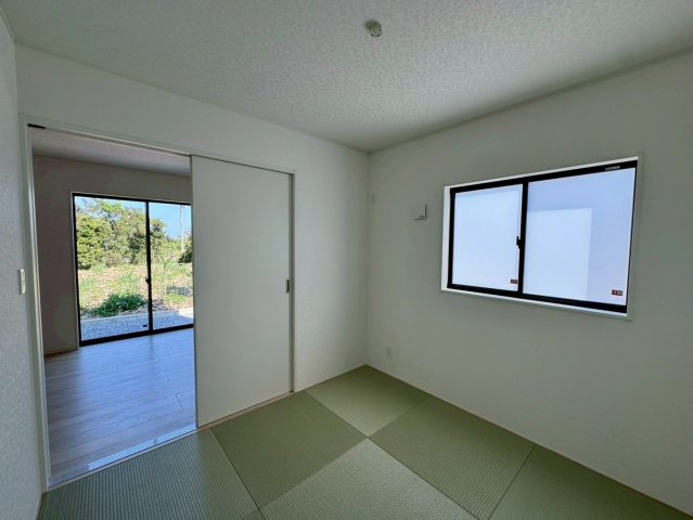 クレイドルガーデン南城市佐敷佐敷 第1・３号棟の和室|リビングに隣接するタタミコーナー4.5帖