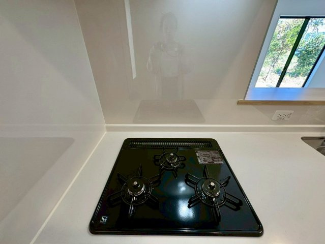 クレイドルガーデン南城市佐敷佐敷 第1・３号棟のキッチン|ガスコンロ３口