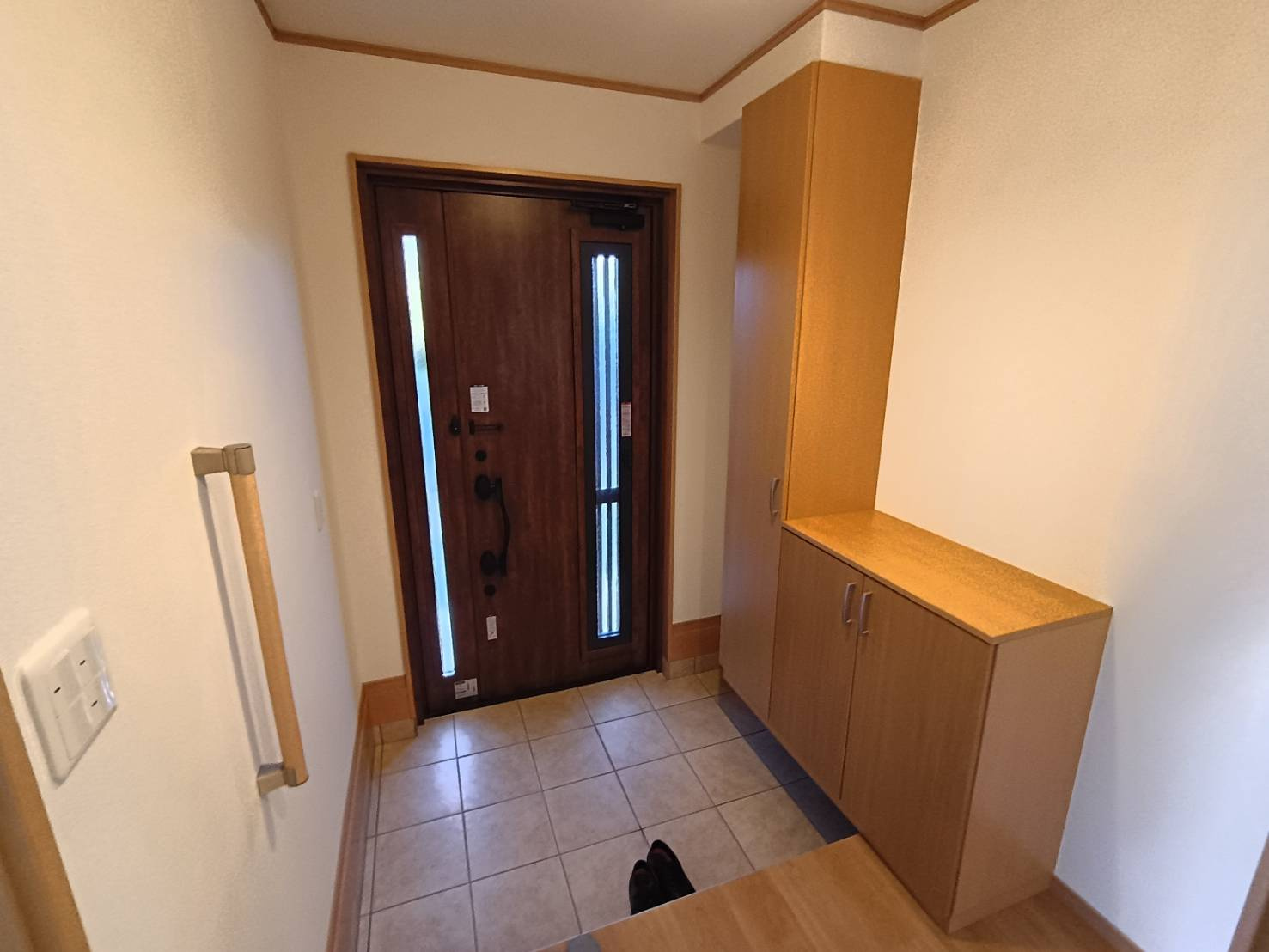 西条市喜多台104-15　中古戸建の玄関