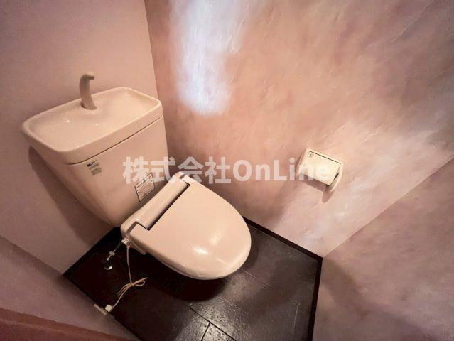 八尾市佐堂町１丁目の賃貸マンションのトイレ